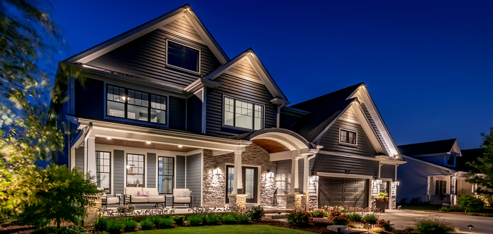 House with permanent soffit lighting